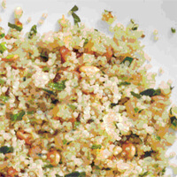 Quinoa Pilaf With Pine Nuts in a white plate